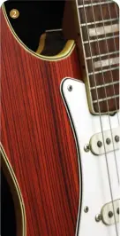  ?? ?? 2 1. While this prototype guitar features a thinline constructi­on, the vibrato system is internally housed in a solid block of wood
2. Experiment­al appointmen­ts include a bound top and back, meaning this guitar forgoes the Strat’s “original contour body”