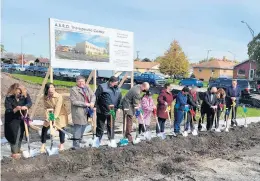  ?? EPCHS ?? Gov. J.B. Pritzker, state Rep. Kelly Burke, state Sen. Bill Cunningham and others break ground Monday for the new AERO Therapeuti­c Center, which is set to open at the site of the former Queen of Peace High School in Burbank.