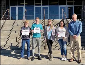  ?? PHOTO SUBMITTED ?? MCHS Students for the week of Dec.10 through Dec.14 are, from left, freshman Wyatt Jordan, sophomore Trayce McCool, junior Samantha Dowd, and senior Alondra Hinojosa, with Mr. Wilkie.