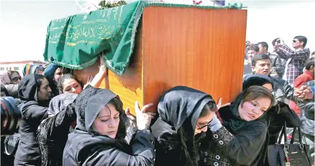  ?? PICTURE: AP PHOTO ?? SYMBOLIC: Afghan women rights activists carry the coffin of 27-year-old Farkhunda, an Afghan woman who was beaten to death by a mob, during her funeral, in Kabul, Afghanista­n