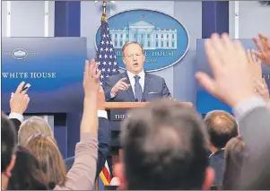  ?? AP PHOTO ?? White House Press secretary Sean Spicer takes questions from the media during the daily briefing in the Brady Press Briefing Room of the White House in Washington, Tuesday.