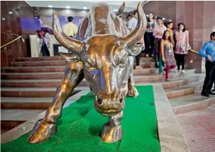  ?? Bloomberg ?? The benchmark S&amp;P BSE Sensex is expected to post its third annual gain in 2018, helped by a revival in company earnings and economic growth. —