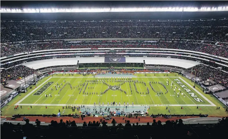  ?? — THE ASSOCIATED PRESS FILES ?? Nearly 80,000 fans turned out for the Raiders-Texans game Monday night at Azteca Stadium in Mexico City, with many cheering for the Raiders.