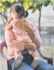  ?? ?? Méndez, who was imprisoned in several prisons in the country a er being captured pregnant during the emergency regime, is photograph­ed with her daughter during an interview with AFP.