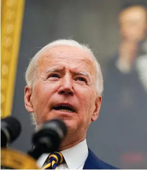  ?? The Associated Press ?? Q President Joe Biden delivers remarks on the economy in the State Dining Room of the White House on Friday in Washington.