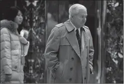  ?? The New York Times/SAM HODGSON ?? Former Defense Secretary Robert Gates (left photo) and John Bolton, a former ambassador to the United Nations, arrive separately at Trump Tower in New York on Friday for meetings with President-elect Donald Trump and his transition team.