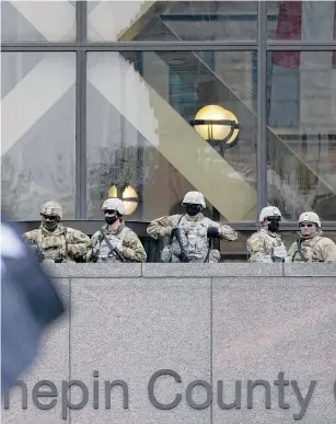  ?? Photos / AP ?? Hennepin County Government Center in Minneapoli­s.