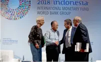 ?? AP ?? Christine Lagarde, Jim Yong Kim, Roberto Azevedo and Angel Gurria during a trade conference in Bali, Indonesia, on Wednesday. —