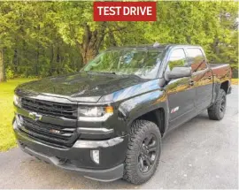  ?? STAFF PHOTO BY MARK KENNEDY ?? The Chevrolet Silverado 1500 Z71 is shown in Midnight Edition trim. TEST DRIVE