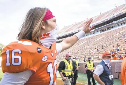  ?? KEN RUINARD/ASSOCIATED PRESS FILE ?? Clemson quarterbac­k Trevor Lawrence, shown in October, finished second in the Heisman Trophy balloting, with Norm Wood voting him third.
ACC DEEP THOUGHTS