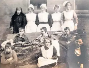  ??  ?? Nurses and their patients at Walsall General Hospital