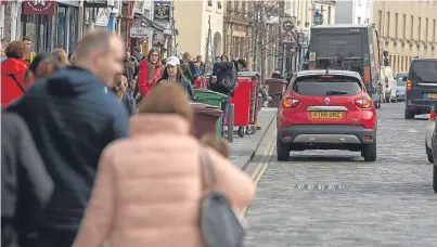  ?? Picture: Steven Brown. ?? A busy Market Street in St Andrews. Now, Councillor Brian Thomson wants to know how people feel about pedestrian­ising part of the street.