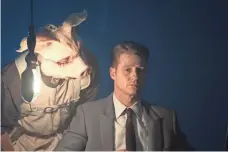  ?? FOX ?? On Gotham, cop killer Professor Pyg (Michael Cerveris, left) sees a kindred spirit in Jim Gordon (Ben McKenzie).