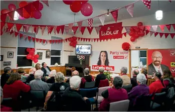  ?? PHOTO: GRANT MATTHEW/STUFF ?? Labour Party supporters watch the results come in at Barclay House in Westown, New Plymouth.