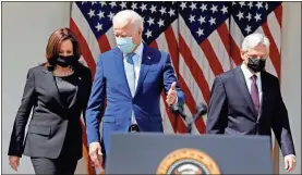  ?? Yuri Gripas/abaca Press/tns ?? U.S. President Joe Biden, Vice President Kamala Harris and Attorney General Merrick Garland arrive to deliver remarks on gun violence prevention in the Rose Garden on Thursday.