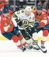  ?? BRUCE BENNETT/GETTY ?? The Bruins’ Brad Marchand skates against the Panthers during the first period Tuesday at Amerant Bank Arena in Sunrise.