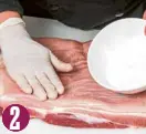  ??  ?? Rub rock salt all over meat skin.