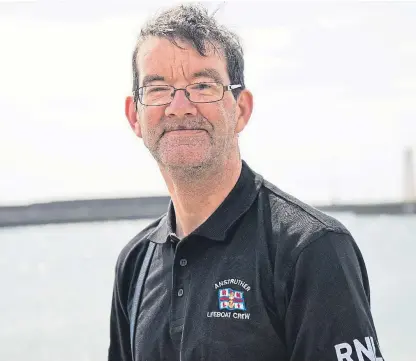  ??  ?? Gary Hughes, who has died aged 55, served with the RNLI for 32 years.