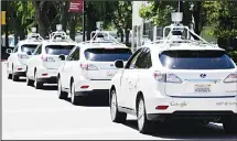  ??  ?? This file photo shows a row of Google self-driving Lexus cars at a Google event outside the Computer History Museum in Mountain View, California.
(AP)