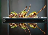  ?? Mark Mulligan/Staff photograph­er ?? Grilled lamb chops with watercress apple salad make a statement at Mark Holley’s Davis St. at Hermann Park.