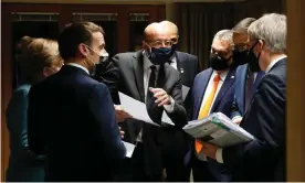  ?? Photograph: Xinhua/Rex/Shuttersto­ck ?? European council president, Charles Michel, talks with other leaders before the EU summit in Brussels on Thursday.