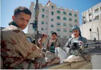  ?? AP ?? Houthi rebels secure a road. Human Rights Watch said that Houthis and forces of Yemen’s ex-president Ali Abdullah Saleh ‘have been flouting the land mine ban at the expense of Yemeni civilians.’ —