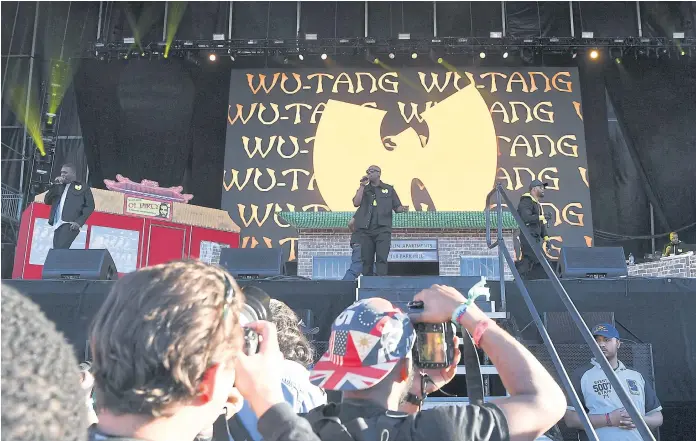  ??  ?? HOT PROPERTY: Wu-Tang Clan perform on stage in New York. There is only one physical version of their ‘Once Upon a Time in Shaolin’ album, and no known digital copies.