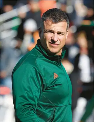  ?? MARK STOCKWELL/AP ?? Hurricanes coach Mario Cristobal, pictured before beating Boston College on Nov. 24, hosted dozens of top recruits at Miami’s Elite Prospect Day over the weekend.