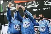  ?? BRYNN ANDERSON — THE ASSOCIATED PRESS ?? Members of Kevin Harvick’s team celebrate after winning the NASCAR Cup Series auto race Sunday in Darlington, S.C.
