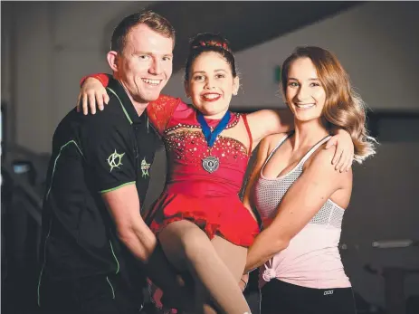  ?? TALENT: Annabella Staples, centre, with her exercise physiologi­st Matt Hurley and figure skating coach Tessa Black. Picture: ALIX SWEENEY ??
