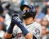  ?? Elaine Thompson / Associated Press ?? For the first time in his career, Marwin Gonzalez homered twice from the right side.