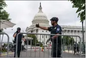  ?? JACQUELYN MARTIN — THE ASSOCIATED PRESS ?? An entrance to the U.S. Capitol in Washington is secured ahead of an abortion rights demonstrat­ors march.