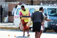  ??  ?? A vendor drops her wares as she runs away from Bulawayo City Council police last week