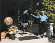  ?? Michael Short / Special to The Chronicle ?? Zona Roberts holds court on her Berkeley porch as friends gather Wednesday to mark her 100th birthday.