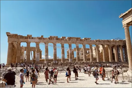  ?? COURTESY OF CATHRYN KNEZEVICH ?? The Parthenon, which is undergoing rehabilita­tion, is the major temple to be seen by visitors after a climb to the Acropolis in Athens.