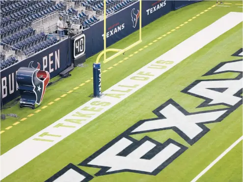  ?? AP FILE ?? “It Takes All Of Us” is painted on NFL end zones this season as part of the league’s Inspire Change platform. In the fallout since Jon Gruden’s emails were revealed, players are again calling for more diversity in league and team leadership positions.