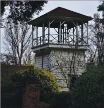  ?? COURTESY PHOTO ?? Janis and Frank Seagrave, who owned the Wright House in the late 20th century, had the water tower moved off the property on Cranberry Avenue to the side of the street, where Janis intended to use it as her studio. The actual water tank is now serving its original purpose in the Santa Cruz Mountains.