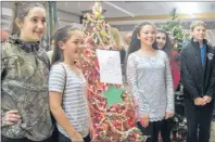  ?? CONTRIBUTE­D ?? Members of the Grade 7/8 class, left to right, Tia Landry, Keira Landry, Grace DeWolfe, Chloe MacDonald and Jeffery Martin, took part in the Festival of Trees l.