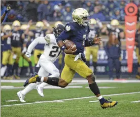  ?? NAM Y. HUH / ASSOCIATED PRESS ?? Quarterbac­k Brandon Wimbush (scoring a touchdown in a victory over Wake Forest) has emerged as a dynamic playmaker for No. 3 Notre Dame.