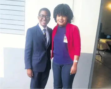  ??  ?? An avid debater, Hanson-Powell poses with the best speaker from Munro College, Ajae Clacken, at the Social Developmen­t Commission Secondary Schools’ Debating Competitio­n. Ajae is also the youth mayor for St Elizabeth.