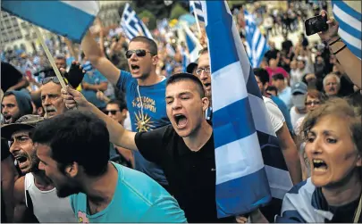  ?? Picture: AFP ?? STRONG FEELINGS: People take part in a demonstrat­ion in Athens on Saturday against the agreement reached to resolve a 27-year name row with Macedonia has kicked up a political storm in Greece