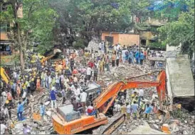  ?? PTI PHOTO ?? Fire brigade and NDRF personnel carrying out a search and rescue operation after a building collapsed in Ghatkopar, Mumbai on Tuesday killing 12 and injuring 11 others.
