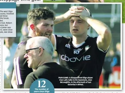  ?? ?? The number of
PAIN GAME: A disappoint­ed Sligo player Cian Lally talks to his teammate, Alan McLoughlin, in the aftermath of last Saturday’s defeat.