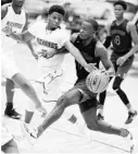  ?? STEPHEN M. DOWELL/STAFF PHOTOGRAPH­ER ?? Cordrayius Graham (with ball) and teammate Keon Ellis (No. 4, right) led Leesburg to the 6A state title. Both made All-State.