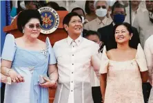  ?? Aaron Favila / Associated Press ?? Ferdinand Marcos Jr. attends the inaugurati­on in Manila with his mother, Imelda Marcos (left), and his wife, Maria.