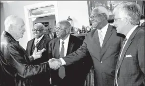  ??  ?? Former Harding University president Clifton Ganus of Searcy with panelists Howard Wright of Atlanta, Fred Gray of Tuskegee, Ala., Elijah Anthonyof Birmingham, Ala., and Harding University Vice President Jim Carr