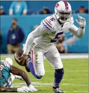  ?? LYNNE SLADKY / ASSOCIATED PRESS ?? The Bills were ready to part ways with QB Tyrod Taylor till he agreed to restructur­e his contract and make it a two-year deal worth $30.5 million.