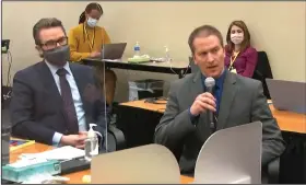  ?? (AP/Court TV) ?? Defense attorney Eric Nelson (left) listens Thursday as former Minneapoli­s police officer Derek Chauvin tells Judge Peter Cahill that he did not plan to testify during his trial in Minneapoli­s.