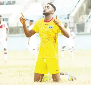  ??  ?? Charles Atsemene of Warri Wolves celebrates his goal against FC IfeanyiUba­h in the aborted 2020 Nigeria Profession­al Football League season