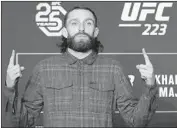  ?? Kathy Willens Associated Press ?? SHORTLY AFTER posing at UFC media day, Michael Chiesa was hospitaliz­ed for a cut on his head.